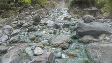 Water And Sulphuric Springs Close To Boiling Point Flow Out Of The Mountain