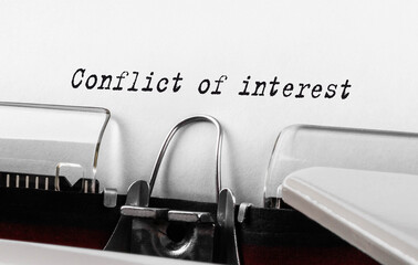 Poster - Text Conflict of interest typed on retro typewriter