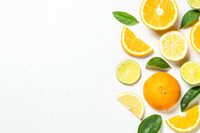Citrus Fruits At White Background.