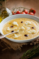 Wall Mural - cauliflower soup with tomatoes chickpeas and balsamic vinegar