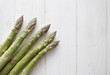 Green Asparagus Vegetable on white wood background