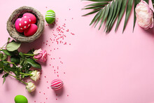 Composition With Beautiful Easter Eggs And Flowers On Color Background