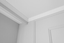 Detail Of Corner Ceiling Cornice With Intricate Crown Moulding.