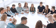 © ASDF - group of young people with smartphones sitting at a round table