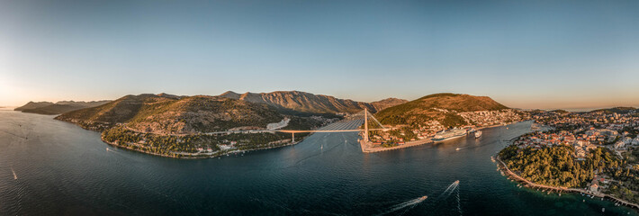 Wall Mural - Aerial panorama drone shot of Dubrovnik bridge at Port Gruz in Lapad Adriatic sea in Croatia summer sunset