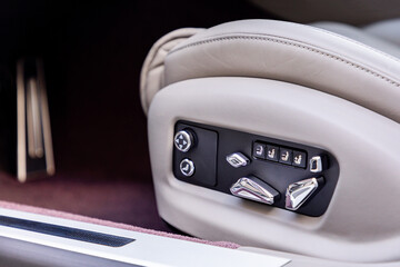 Wall Mural - Seat controls in a luxurious car