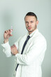 © Novak - Portrait of handsome male doctor with vaccine