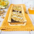 Chocolate-butterscotch mazurek with nuts in honey. Traditional Polish cake with a crispy base, baked on the occasion of Easter.