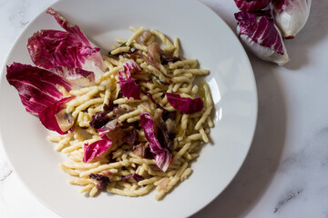 Wall Mural - Trofie with radicchio. Autumn dish vegetarian version..