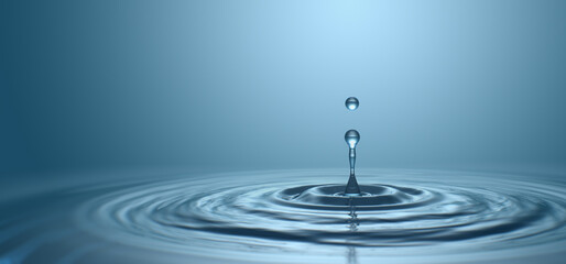 Water drop with droplet and rings on surface bluish background