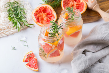 Wall Mural - Hard seltzer cocktail with grapefruit and rosemary