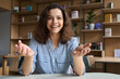 © insta_photos - Happy latin young woman online tutor, remote school teacher or student talking to camera at virtual class making video call looking at web cam having distance meeting, recording video presentation.
