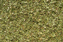 Pile Of Dried Green Oregano Texture Or Background.