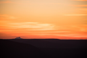 Wall Mural - Colorful sunset over the mountain hills. Beautiful landscape in Azerbaijan nature.