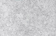 Grain Quartz Surface For Bathroom Or Kitchen Or Countertop In Grey Color Tone. Close Up Terazzo Quartz Stone Texture Use For Background.