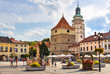 Panoramic View Of Market Square With Historic Stone Bell Tower And Cathedral Of Nativity Of Blessed Virgin Mary In Zywiec, Silesia Region Of Poland