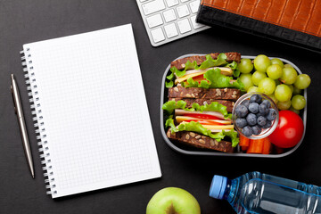 Wall Mural - Healthy office lunch box with sandwich and fresh vegetables