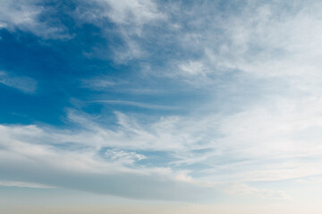Wall Mural - beautiful blue sky with stretched white clouds