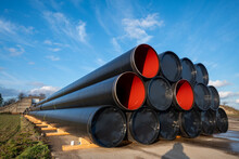 A Stack Of Pipes On The Construction Site Of A Gas Pipeline That Will Be Laid On The Seabed
