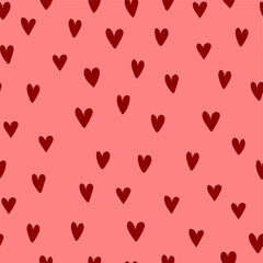 Abstract seamless pattern with red hearts on a pink background. Hand drawn style