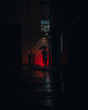 Man alone in a dark alleyway