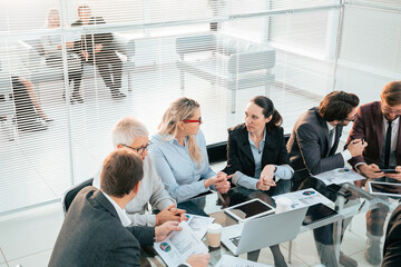 Wall Mural - business team discussing financial data at an office meeting .