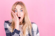 © Studio Nova - Portrait of young surprised blonde woman in plaid shirt isolated on pink background