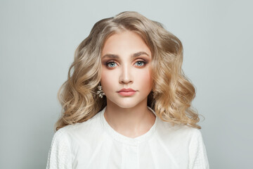 Wall Mural - attractive model woman with blonde hair on white background