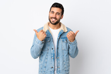 Wall Mural - Young handsome man with beard isolated on white background with thumbs up gesture and smiling