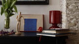 Fototapeta  - Komódka mebel w salonie z ramką czerwoną, karteczką kolorową i lampką szklaną bordową