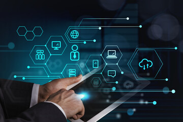 Poster - Businessman hand and touchscreen with data symbols and network circuit