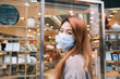 © Pansfun Images/Stocksy - fashion Asian woman wear mask portrait