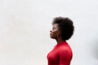 © Jimena Roquero/Stocksy - Portrait of attractive black woman in profile