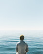 © Luis Herrera/Stocksy - man looking at the vastness of the lake