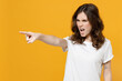 © ViDi Studio - Young strict angry caucasian student woman 20s in white basic casual blank print design t-shirt point index finger camera on you command do it isolated on yellow orange background studio portrait.