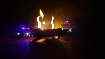 Wall Mural - Police car chasing a car at night with fog background. 911 Emergency response police car speeding to scene of crime. Selective focus