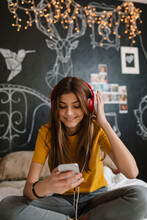 Young Teenage Girl Having Fun Listening Music