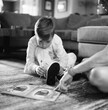 © Jakob Lagerstedt/Stocksy - Young boy learning how to tie his shoes