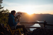 © Boris Jovanovic/Stocksy - Girl Watching Sunset With Her Dog
