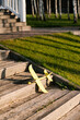 © Alina Hvostikova/Stocksy - Toy plane on wooden steps