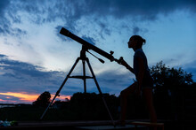 Imagination Of Young Girl With Telescope