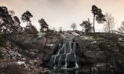 Wall Mural - Landscape photo with waterfall in public city park of Kotka, Finland