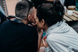 © Evil Pixels Photography/Stocksy - Woman Whispering To Her Friend