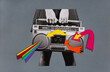 © kkgas/Stocksy - Cassette deck with rainbow and arrows