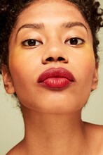Young woman with red lips portrait
