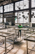 © Raymond Forbes Photography/Stocksy - Hispanic Man polishing countertop at Industrial Company