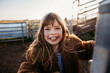 © Claira Whipp/Stocksy - smiling girl outdoors