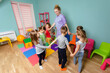 © oksix - Joyful dancing classes for kids at daycare