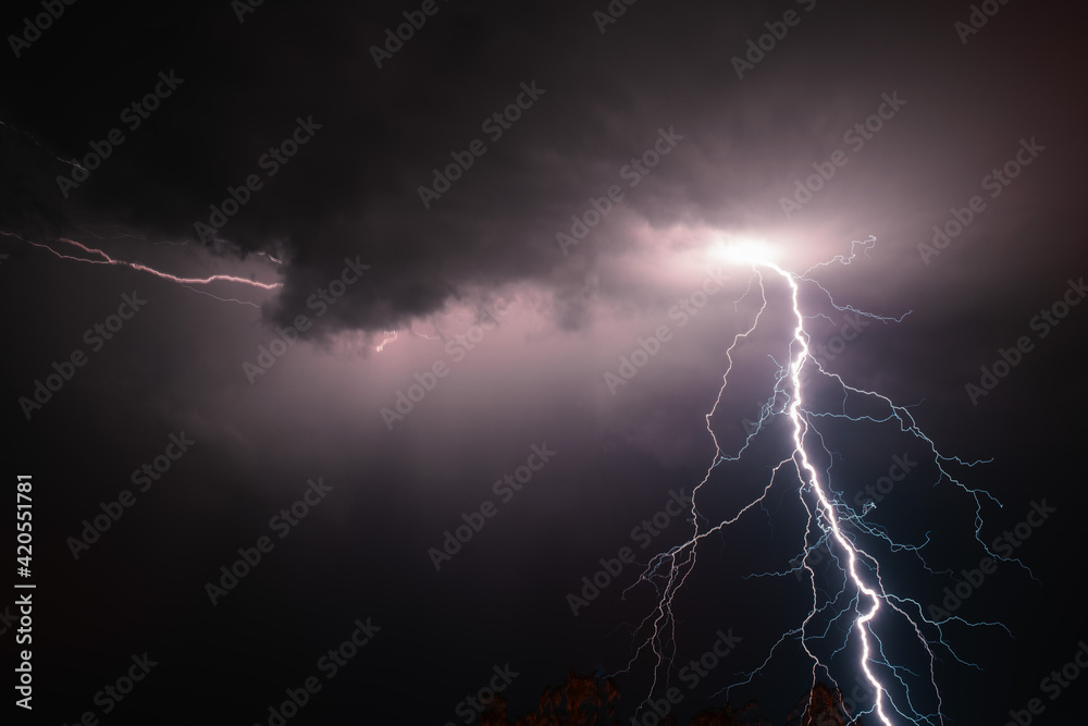 Lightning in the night sky Stock Photo | Adobe Stock