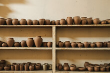 Shelf Full Of Ceramic Pots